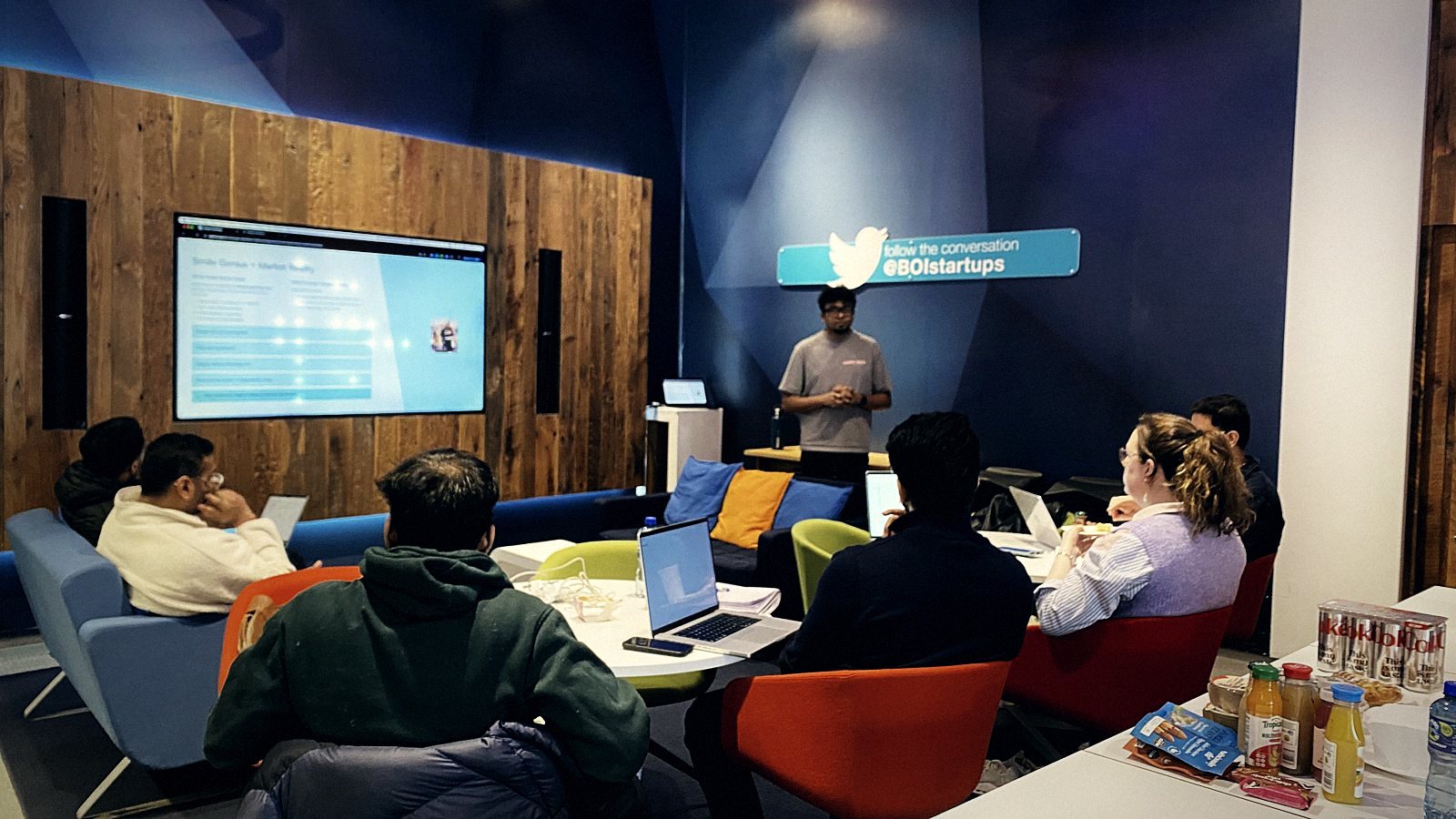 A team presenting in the April room