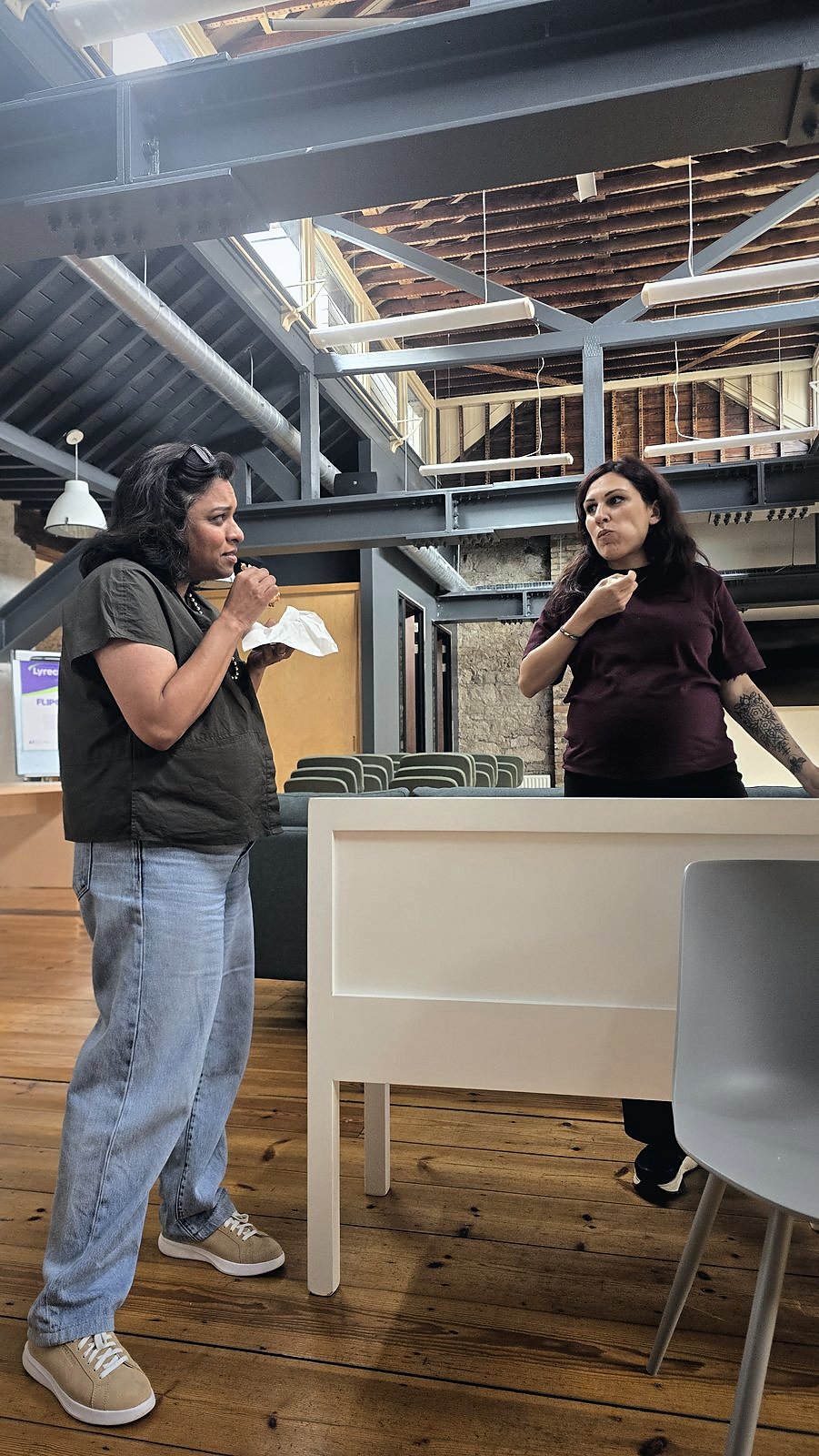Comparing notes at the desk
